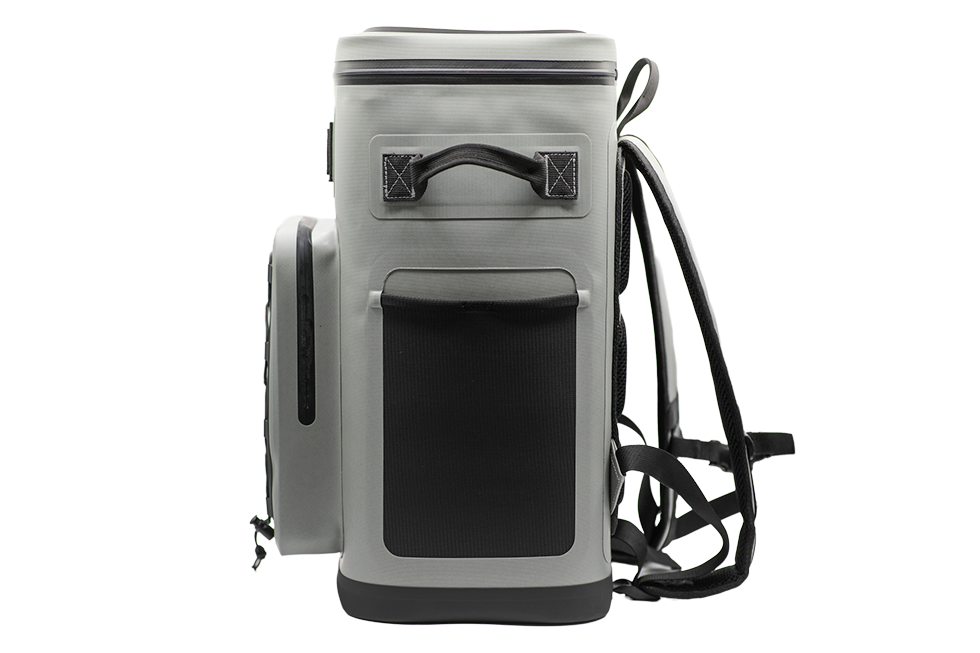 Side view of a gray Maluna Soft-sided Cooler Backpack featuring a top handle, side storage pocket, and adjustable shoulder straps.